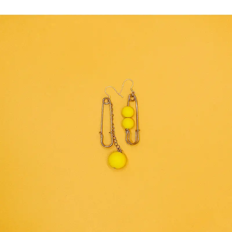 STRANGE ASYMMETRIC EARRINGS