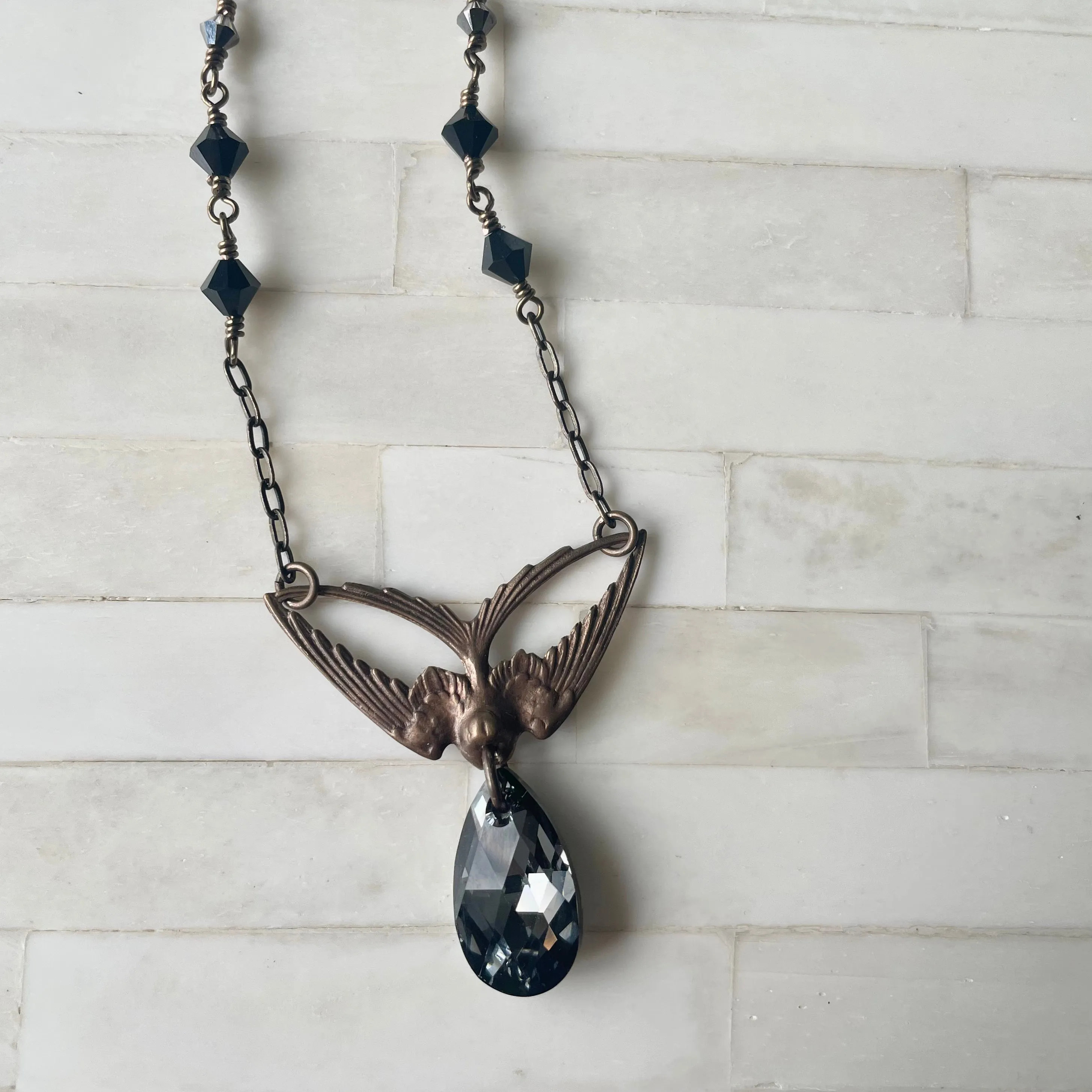 Swoop - Brass Swallow and Black Diamond Crystal Necklace